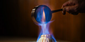 Colorado Springs Has Its First Michelin Award Winners Flambeed Baked Alaska prepared tableside at The Penrose Room at The Broadmoor, one of the first Colorado Springs Michelin awards.