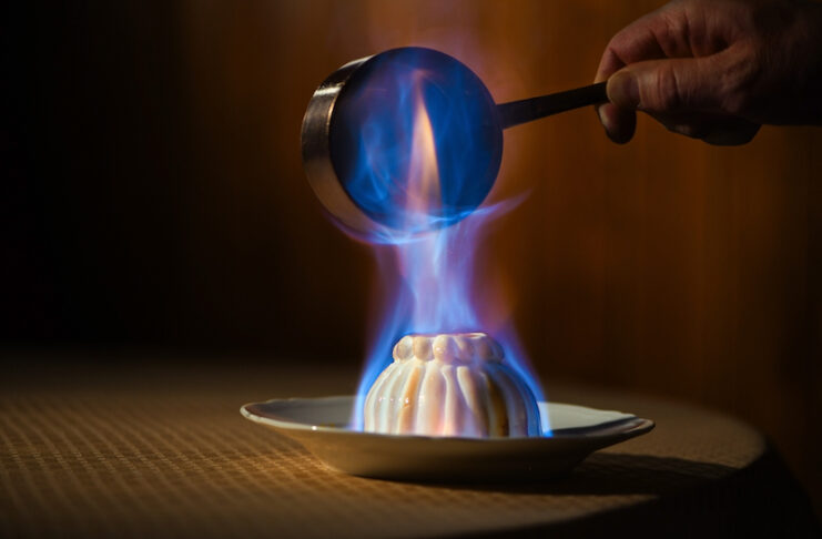 Flambeed Baked Alaska prepared tableside at The Penrose Room at The Broadmoor, one of the first Colorado Springs Michelin awards.