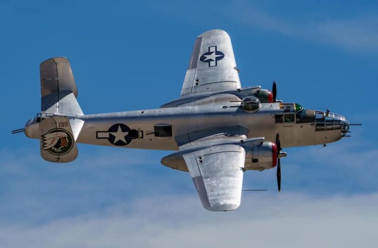 Vintage B-25 Mitchell Bomber flies over the Pikes Peak Airshow in Colorado Springs.