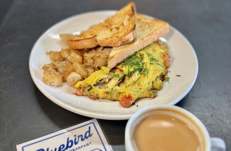 An omelette and craft coffee at Bluebird Breakfast, now open and serving breakfast at Ivywild School.